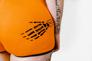 
            
                Load image into Gallery viewer, Orange Skeleton Shorts
            
        